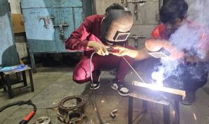 Mechanical Engineering students Jiten Sapkota and Kishor Kumar Ghalley